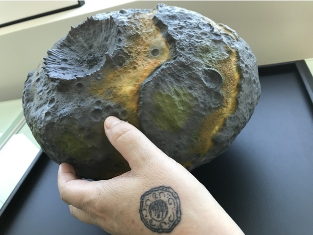 Large painted 3-D model of the Psyche Asteroid