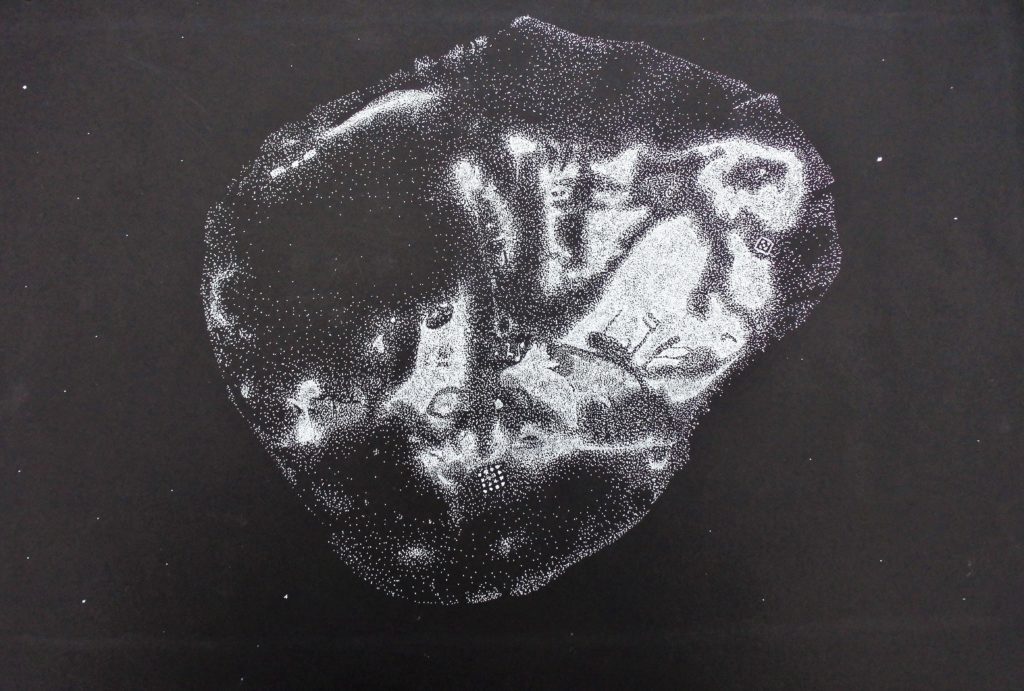 This image shows a black paper background onto which has been painted an artist's rendition of the Psyche asteroid using thousands of tiny white dots.