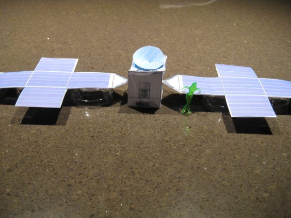 A paper model of the psyche spacecraft.